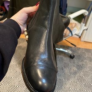 Leather black boots with pearl detailing